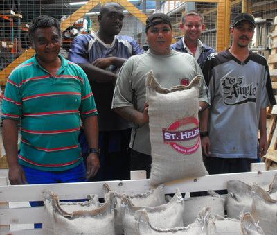 St Helena coffee farmers holding bags of coffee